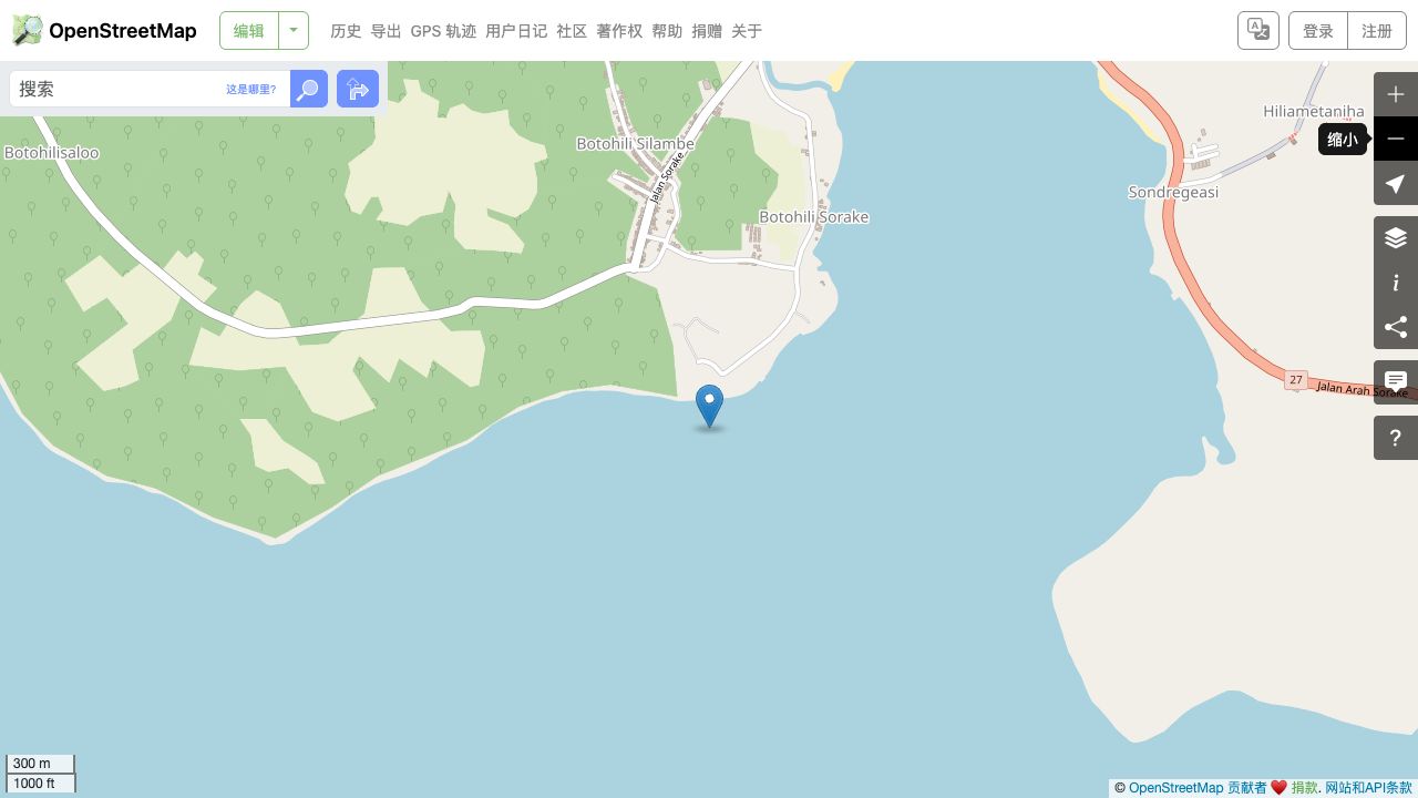 Lagundri参考标记与湾岸村落道路背景;不定位主右礁、通道或入口。